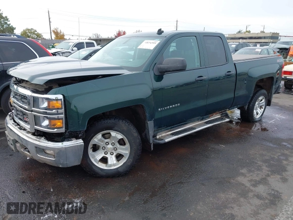 2014 Chevrolet Silverado 1500 LT with VIN 1GCVKREC7EZ312679, listed as a IAAI auction lot 40874395 with 153,234 mi miles and . Bid and sale history available at DreamBid. Image 2.