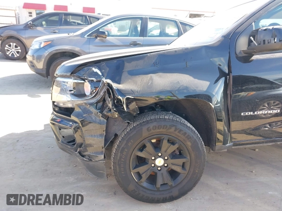 2021 Chevrolet Colorado 2WD LT with VIN 1GCGSCEN8M1127786, listed as a IAAI auction lot 41672930 with 77,381 mi miles. Bid and sale history available at carsss.com. Image 6.