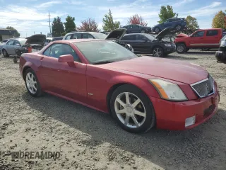 2005 Cadillac XLR z VIN 1G6YV34AX55600501, wystawiony jako Copart lot #72423004 z przebiegiem 31 601 mil mil oraz Szkody całkowita. Historia ofert i sprzedaży dostępna na DreamBid. Obrazek 4.