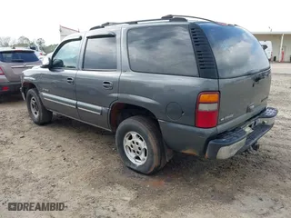 2002 Chevrolet Tahoe LT with VIN 1GNEK13Z42J203185, listed as a IAAI auction lot 41940552 with 325,618 mi miles. Bid and sale history available at carsss.com. Image 3.