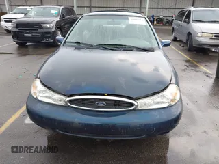 1998 Ford Contour with VIN 3FAFP663XWM122628, listed as a IAAI auction lot 42692574 with 227,055 mi miles and . Bid and sale history available at DreamBid. Image 6.