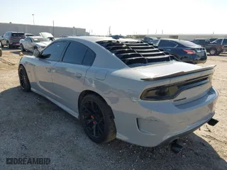 2021 Dodge Charger Scat Pack with VIN 2C3CDXGJ8MH539917, listed as a IAAI auction lot 41651136 with 53,314 mi miles. Bid and sale history available at carsss.com. Image 3.