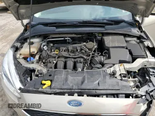2015 Ford Focus SE z VIN 1FADP3F29FL312757, wystawiony jako Copart lot #61198315 z przebiegiem 84 944 mil mil oraz Szkoda całkowita • Salvage title. Historia ofert i sprzedaży dostępna na DreamBid. Obrazek 11.