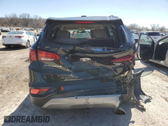 2017 Hyundai Santa Fe 2.4L z VIN 5NMZUDLB4HH032235, wystawiony jako Copart lot #49769775 z przebiegiem 102 655 mil mil oraz Szkoda całkowita • Salvage title. Historia ofert i sprzedaży dostępna na DreamBid. Obrazek 6.