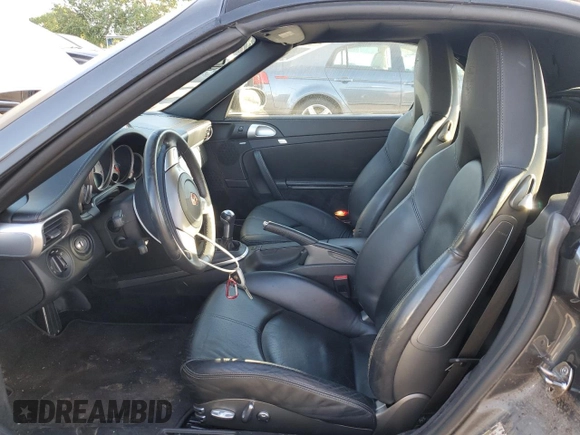 2007 Porsche 911 Carrera S with VIN WP0CB29917S776849, listed as a Copart auction lot 51169625 with 27,283 mi miles and Salvage Title. Bid and sale history available at DreamBid. Image 7.