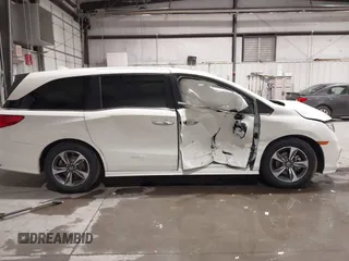 2019 Honda Odyssey Touring with VIN 5FNRL6H83KB051363, listed as a IAAI auction lot 41173587 with 88,512 mi miles. Bid and sale history available at carsss.com. Image 12.