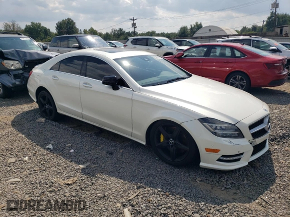 2014 Mercedes-Benz CLS-Class CLS 550 with VIN WDDLJ9BB9EA117290, listed as a Copart auction lot 68517414 with 98,705 mi miles and Salvage Title. Bid and sale history available at carsss.com. Image 4.