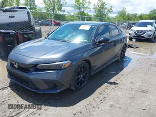 2022 Honda Civic Sport z VIN 2HGFE2F58NH560511, wystawiony jako IAAI lot #42346044 z przebiegiem 51 357 mil mil oraz . Historia ofert i sprzedaży dostępna na DreamBid. Obrazek 18.