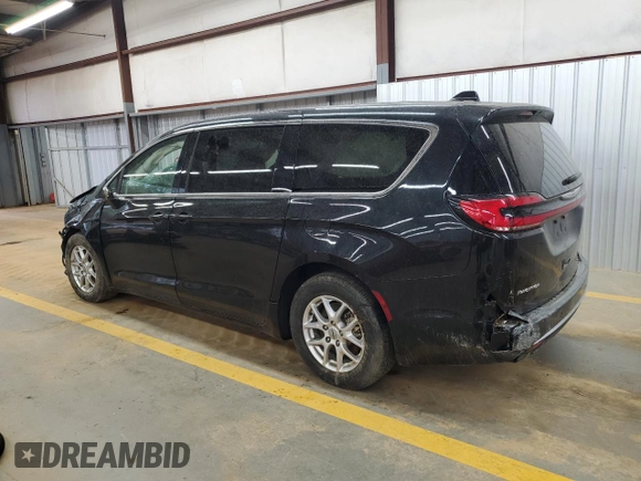 2023 Chrysler Pacifica Touring L with VIN 2C4RC1BG3PR582271, listed as a Copart auction lot 51644595 with 57,930 mi miles and Salvage title. Bid and sale history available at DreamBid. Image 2.