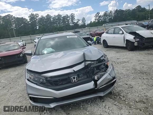 2021 Honda Civic LX z VIN 2HGFC2F6XMH503160, wystawiony jako Copart lot #56726425 z przebiegiem 67 134 mil mil oraz Szkoda całkowita • Salvage title. Historia ofert i sprzedaży dostępna na DreamBid. Obrazek 13.