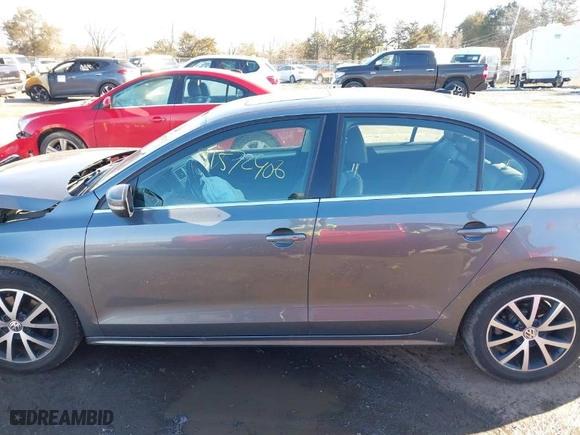 2017 Volkswagen Jetta 1.4T SE with VIN 3VWB67AJ7HM299130, listed as a IAAI auction lot 41572406 with 115,898 mi miles. Bid and sale history available at carsss.com. Image 14.