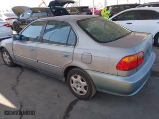 1999 Honda Civic EX with VIN 2HGEJ8640XH505636, listed as a IAAI auction lot 41629850 with 369,637 mi miles. Bid and sale history available at carsss.com. Image 3.