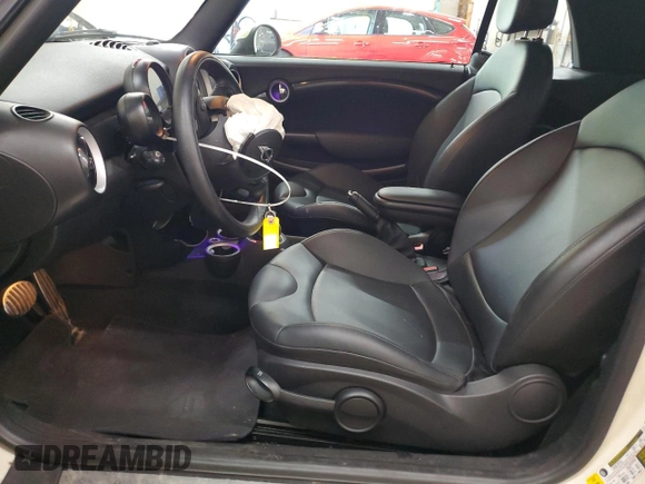 2015 MINI Convertible S с VIN WMWZP3C54F2A90956, выставлен на аукционе Copart как лот 57052545 с пробегом 39 096 миль миль и Списание • Salvage title. История ставок и продаж доступна на DreamBid. Изображение 7.