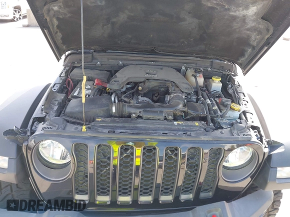 2021 Jeep Gladiator Rubicon z VIN 1C6JJTBG6ML535939, wystawiony jako IAAI lot #42260764 z przebiegiem 114 060 mil mil oraz . Historia ofert i sprzedaży dostępna na DreamBid. Obrazek 10.