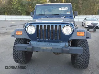 2001 Jeep Wrangler Sport with VIN 1J4FA49S21P346900, listed as a Copart auction lot 75439604 with 128,824 mi miles and Clean Title. Bid and sale history available at carsss.com. Image 5.