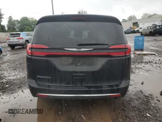 2022 Chrysler Pacifica Touring L with VIN 2C4RC1BGXNR190806, listed as a Copart auction lot 56557535 with 47,170 mi miles and Salvage Title. Bid and sale history available at DreamBid. Image 6.