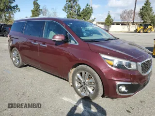 2015 Kia Sedona SX-L with VIN KNDME5C10F6037740, listed as a Copart auction lot 51162595 with 128,111 mi miles and Salvage Title. Bid and sale history available at DreamBid. Image 4.