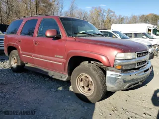 2002 Chevrolet Tahoe LT with VIN 1GNEK13Z02J300108, listed as a Copart auction lot 82101194 with 310,703 mi miles and Clean Title. Bid and sale history available at carsss.com. Image 4.