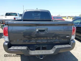 2023 Toyota Tacoma SR5 z VIN 3TMDZ5BN6PM153633, wystawiony jako IAAI lot #42353187 z przebiegiem 50 020 mil mil oraz . Historia ofert i sprzedaży dostępna na DreamBid. Obrazek 17.