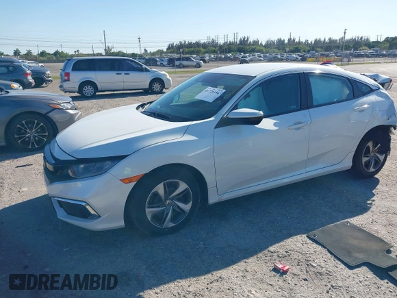 2020 Honda Civic LX z VIN 19XFC2F68LE206395, wystawiony jako IAAI lot #41720356 z przebiegiem 38 037 mil mil oraz . Historia ofert i sprzedaży dostępna na DreamBid. Obrazek 18.