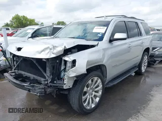 2019 Chevrolet Tahoe LT with VIN 1GNSCBKC7KR326466, listed as a IAAI auction lot 42048492 with 65,913 mi miles and . Bid and sale history available at DreamBid. Image 2.