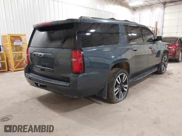 2019 Chevrolet Suburban Premier with VIN 1GNSKJKJ8KR169252, listed as a IAAI auction lot 41472231 with 95,266 mi miles and . Bid and sale history available at DreamBid. Image 4.