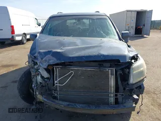 2006 Honda Pilot EX-L with VIN 5FNYF18656B012252, listed as a IAAI auction lot 41801738 with 246,191 mi miles and . Bid and sale history available at DreamBid. Image 13.