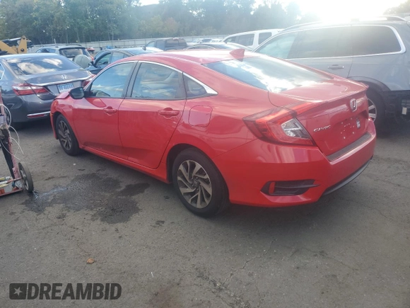 2018 Honda Civic EX with VIN 2HGFC2F74JH530701, listed as a Copart auction lot 74676554 with 69,624 mi miles and Salvage Title. Bid and sale history available at DreamBid. Image 2.