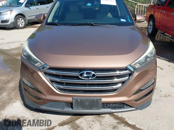 2016 Hyundai Tucson Limited with VIN KM8J33A25GU074798, listed as a IAAI auction lot 42103566 with 143,777 mi miles and . Bid and sale history available at carsss.com. Image 12.