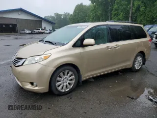 2011 Toyota Sienna XLE with VIN 5TDDK3DC5BS007821, listed as a Copart auction lot 60862535 with 218,090 mi miles and Salvage title. Bid and sale history available at DreamBid. Image 1.