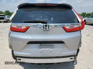 2019 Honda CR-V LX z VIN 2HKRW5H32KH406837, wystawiony jako Copart lot #57111585 z przebiegiem 123 047 mil mil oraz Szkoda całkowita • Salvage title. Historia ofert i sprzedaży dostępna na DreamBid. Obrazek 6.