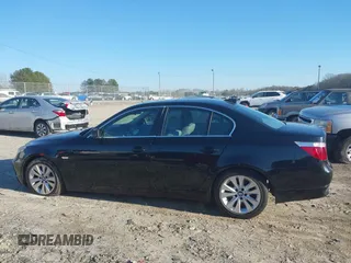 2005 BMW 5 Series 545i with VIN WBANB33515B089725, listed as a IAAI auction lot 41504335 with 117,657 mi miles and . Bid and sale history available at carsss.com. Image 14.