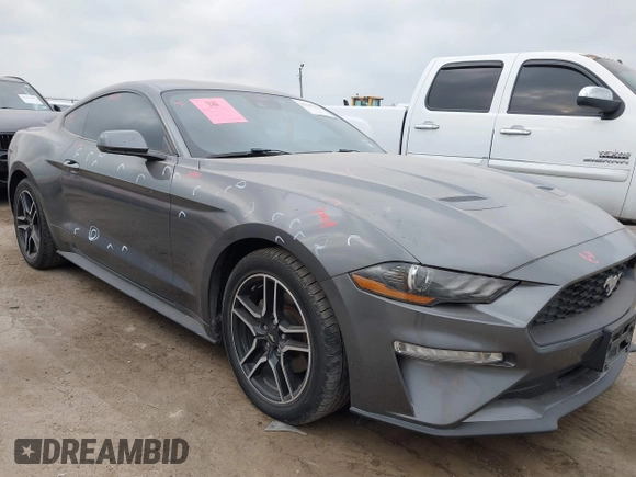 2021 Ford Mustang EcoBoost with VIN 1FA6P8TH0M5115864, listed as a IAAI auction lot 42287791 with 94,842 mi miles and . Bid and sale history available at DreamBid. Image 1.