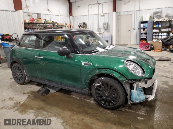 2020 MINI Hardtop Cooper with VIN WMWXR3C06L2M21499, listed as a Copart auction lot 45182905 with 48,912 mi miles and Salvage title. Bid and sale history available at DreamBid. Image 4.
