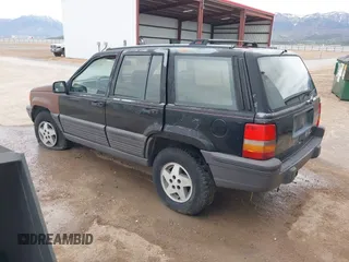 1994 Jeep Grand Cherokee Laredo with VIN 1J4GZ58S2RC118838, listed as a IAAI auction lot 42047224 with 160,715 mi miles. Bid and sale history available at carsss.com. Image 3.