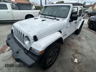 2023 Jeep Wrangler Sahara with VIN 1C4HJXENXPW586579, listed as a IAAI auction lot 41795621 with 34,433 mi miles. Bid and sale history available at carsss.com. Image 2.