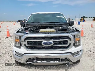 2021 Ford F-150 XL with VIN 1FTEW1C53MKD32347, listed as a Copart auction lot 59363075 with 111,827 mi miles and Salvage title. Bid and sale history available at DreamBid. Image 5.