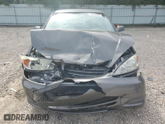 2004 Toyota Camry LE z VIN 4T1BE32K74U848946, wystawiony jako Copart lot #56030995 z przebiegiem Nie podano mil oraz Szkoda całkowita • Salvage title. Historia ofert i sprzedaży dostępna na DreamBid. Obrazek 5.