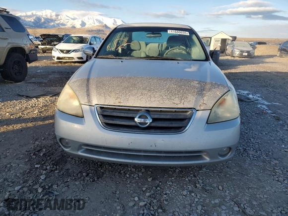 2003 Nissan Altima SE with VIN 1N4BL11D03C142767, listed as a Copart auction lot 41680035 with 216,963 mi miles and Salvage title. Bid and sale history available at DreamBid. Image 5.