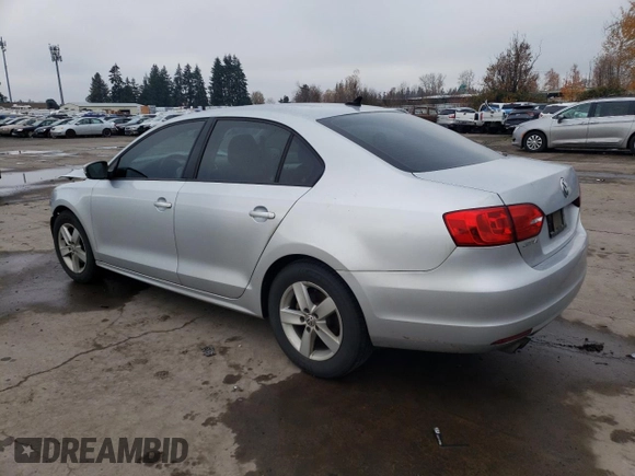 2012 Volkswagen Jetta Sedan TDI with VIN 3VW3L7AJ0CM089765, listed as a Copart auction lot 82358034 with 144,648 mi miles and Salvage Title. Bid and sale history available at carsss.com. Image 2.