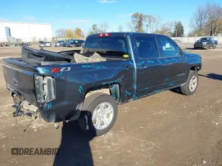2018 Chevrolet Silverado 1500 LT with VIN 3GCUKRECXJG321396, listed as a IAAI auction lot 40851181 with 137,348 mi miles. Bid and sale history available at carsss.com. Image 4.