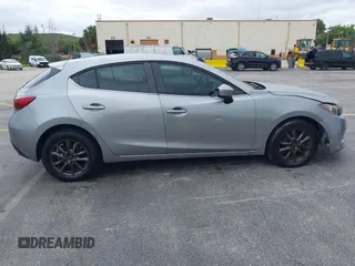 2014 Mazda 3 i Grand Touring with VIN JM1BM1M73E1216596, listed as a IAAI auction lot 41621165 with 127,235 mi miles and . Bid and sale history available at DreamBid. Image 13.