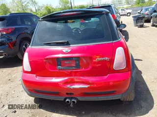 2003 MINI Hardtop S z VIN WMWRE33443TD60271, wystawiony jako IAAI lot #42129529 z przebiegiem 94 082 mil mil oraz . Historia ofert i sprzedaży dostępna na DreamBid. Obrazek 16.