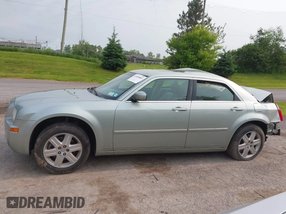 2006 Chrysler 300 Touring z VIN 2C3KK53G06H242398, wystawiony jako IAAI lot #42404803 z przebiegiem 163 947 mil mil oraz . Historia ofert i sprzedaży dostępna na DreamBid. Obrazek 14.