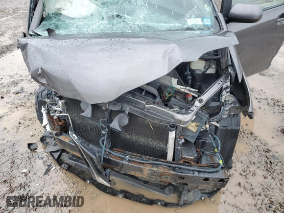 2018 Toyota Sienna LE z VIN 5TDJZ3DC6JS199103, wystawiony jako Copart lot #57821175 z przebiegiem Nie podano mil oraz Szkoda całkowita • Salvage title. Historia ofert i sprzedaży dostępna na DreamBid. Obrazek 12.