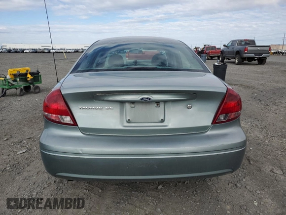 2006 Ford Taurus SE z VIN 1FAFP53U76A109890, wystawiony jako Copart lot #57135575 z przebiegiem 160 750 mil mil oraz Szkoda całkowita • Salvage title. Historia ofert i sprzedaży dostępna na DreamBid. Obrazek 6.
