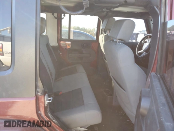 2010 Jeep Wrangler Unlimited Sahara with VIN 1J4BA5H1XAL196555, listed as a Copart auction lot 76704534 with 112,365 mi miles and Salvage Title. Bid and sale history available at carsss.com. Image 10.