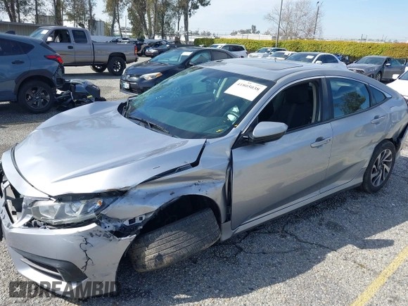 2016 Honda Civic Sedan EX with VIN 2HGFC2F74GH563268, listed as a IAAI auction lot 41805038 with 125,577 mi miles. Bid and sale history available at carsss.com. Image 17.