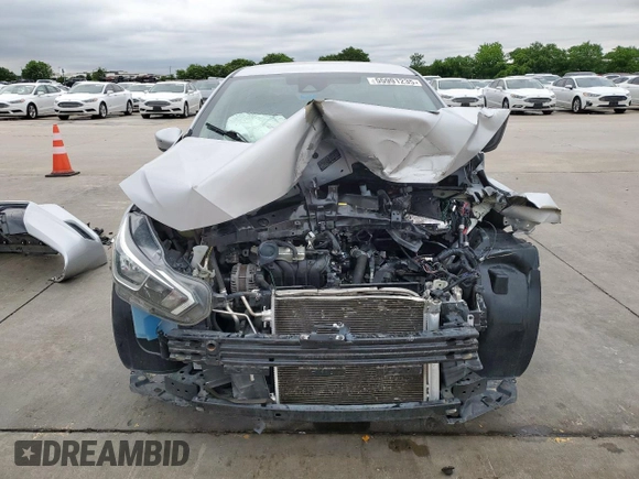 2021 Nissan Versa SV z VIN 3N1CN8EV3ML833899, wystawiony jako Copart lot #55991235 z przebiegiem 65 021 mil mil oraz Szkoda całkowita • Salvage title. Historia ofert i sprzedaży dostępna na DreamBid. Obrazek 5.