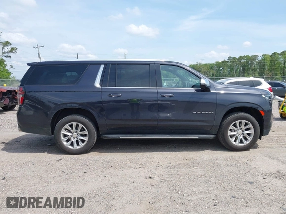 2023 Chevrolet Suburban Premier z VIN 1GNSCFKD8PR479381, wystawiony jako IAAI lot #42096493 z przebiegiem 41 538 mil mil oraz . Historia ofert i sprzedaży dostępna na DreamBid. Obrazek 13.